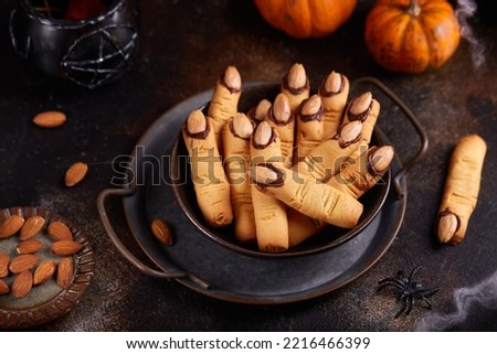 Similar – Image, Stock Photo Cookies fingers and pumpkin hummus