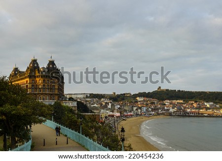 SCARBOROUGH, ENGLAND - SEPTEMBER 13: View of Grand Hotel (left), Scarborough beach, harbour and seafront. 13TH September 2014.