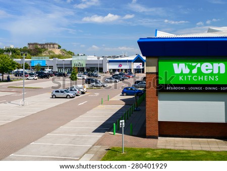 NOTTINGHAM, ENGLAND - MAY 21: Wren Kitchens, car park, and other retailers at Castle Marina Retail Park in Nottingham, England on 21st May 2015.