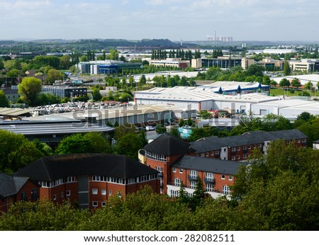 NOTTINGHAM, ENGLAND - MAY 26: Nottingham skyline looking SW from Castle.  Castle Marina Retail Park. The cooling towers of Ratcliffe power station on horizon. On 26th May 2015. In Nottingham, England.