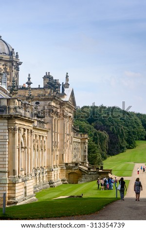 CASTLE HOWARD, YORK - AUGUST 22: A group of tourists, with tour guide. Castle Howard, York, England. On 22nd August 2015.