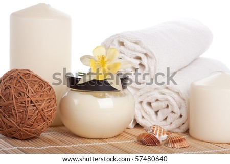 Spa composition with flower on a white background.
