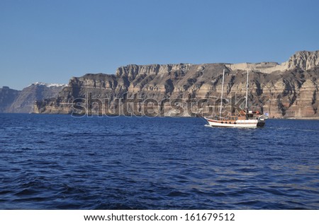 The Greek island of Crete is situated in the Mediterranean sea. Rocky shore of the sea.