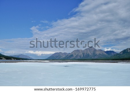 Russia, Yakutia, a ridge of Suntar-khayata, river Suntar, August. The permanent ice fields in the tideway of the Yakut river.