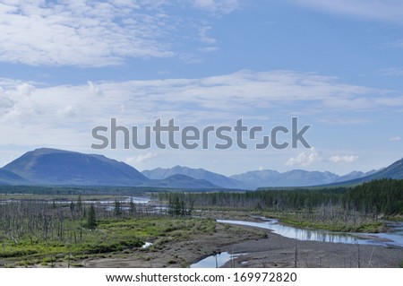 Mountain river Suntar. Landscape of the far corners of the earth in Yakutia. Ridge Suntar-Khayata, Russia.