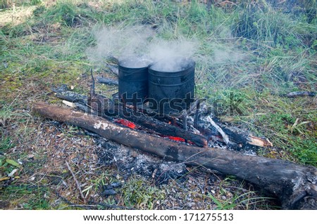 Cooking on a fire. Cooking in field conditions spur the imagination of chefs.