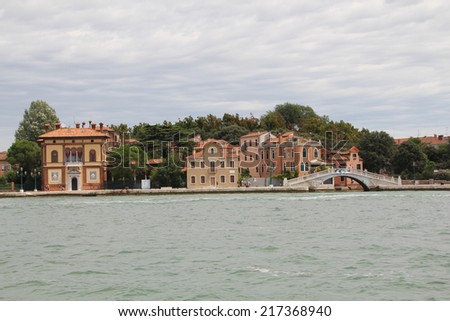 Venice, view from the side of the lagoon. Water landscapes of Venice: the sea, marinas, boats, quays.