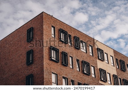 Similar – Image, Stock Photo Brick facade with window and unicorn balloon