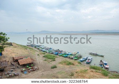 BAGAN, MYANMAR, MAY 4, 2013 : Traders transport foods and products to the market through Irrawaddy river. The river is just few kilometers away from old Bagan, a popular tourist attraction.