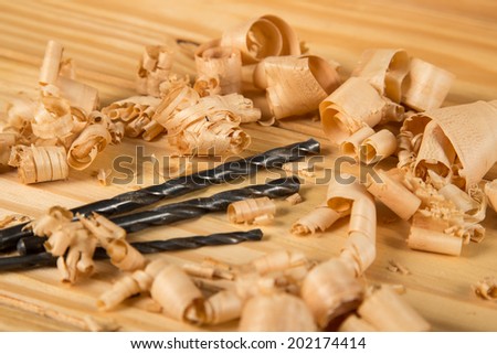 Wood shavings and drill bits