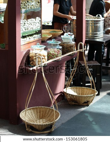 Thai retro style food snack sweet and baked exhibition shop show and sale cookies and snacks for tea and coffee in vintage glass jar decorated with retro objects