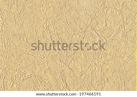 Photograph of coarse, wrinkled artificial leather yellow texture sample
