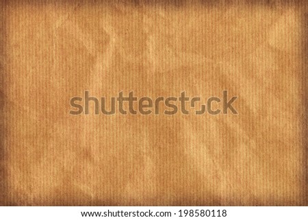 Photograph of recycle brown kraft striped paper coarse grain, crushed, crumpled, vignette, grunge texture sample