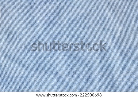 Photograph of Blue Cotton denim fabric crumpled texture sample..