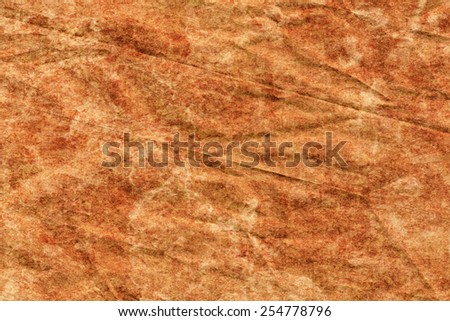 Photograph of old Recycle Kraft Brown Paper, coarse grain, crushed crumpled, bleached, mottled, grunge texture sample.