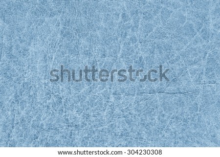 Photograph of old Blue animal skin parchment, creased, coarse grained, grunge texture sample.