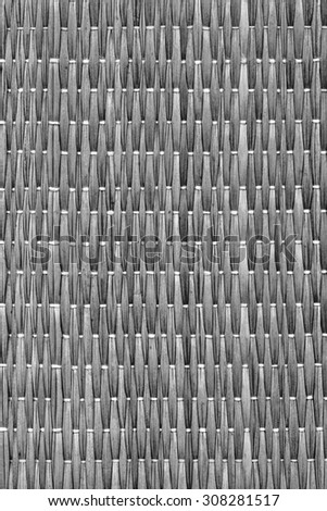 Straw Place Mat Weave Pattern, Bleached and Stained Dark Gray, Grunge Texture Sample.