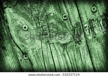 Old Weathered, Rotten, Cracked Planking, Bleached and Stained Green, Vignette Grunge Texture Detail.