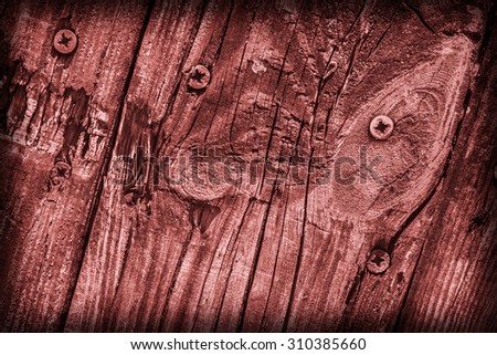 Old Weathered, Rotten, Cracked Planking, Bleached and Stained Red, Vignette Grunge Texture Detail.