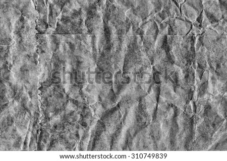 Recycle Kraft Paper, Coarse Grain, Crumpled, Blotted, Mottled, Bleached and Stained Gray, Grunge Texture Sample.