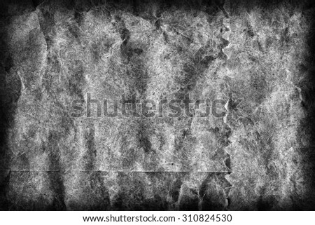 Recycle Kraft Paper, Coarse Grain, Crumpled, Blotted, Mottled, Bleached and Stained Gray, Vignette, Grunge Texture Sample.