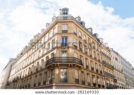 PARIS MAY 07, 2015: French architecture with apartment building looking upward at the Paris Le Marais quarter taken on May 07, 2015 in Paris, France