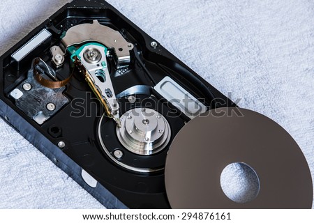 Close up of open computer hard disk drive (HDD). Inside harddisk