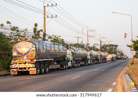 MAE SOT THAILAND - APRIL11 : A long line of fuel trucks waiting for clearance to export at Mae Sot, Tak, Thailand on APRIL11, 2015. Fuel exports are top ten export products of Thailand to Myanmar.