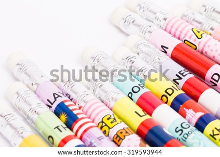 Eraser on pencils holder with ASEAN flag pattern on white background
