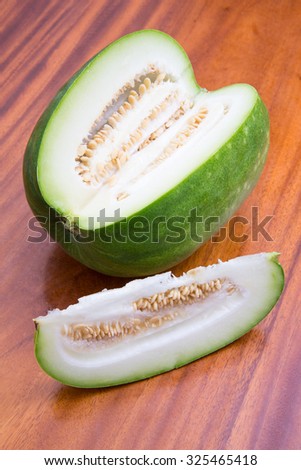 Winter melon on tableware made of wood