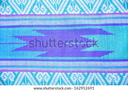 Patterned fabric woven native Thailand.