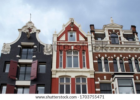 Similar – Foto Bild Fassade eines Wohnhaus in Beige und Naturfarben im Licht der Abendsonne am Abend im Stadtteil Bornheim in Frankfurt am Main in Hessen