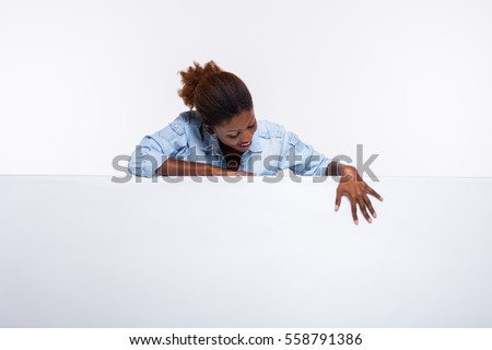 Similar – Image, Stock Photo Cheerful black woman leaning on railing in port