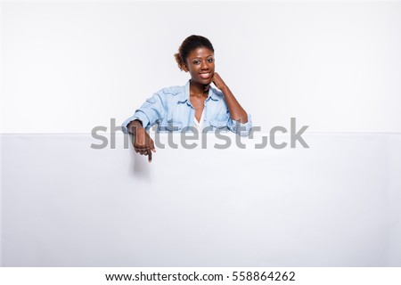 Similar – Image, Stock Photo Cheerful black woman leaning on railing in port