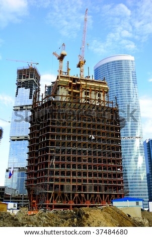 Construction of skyscrapers from glass, a steel and concrete of a complex of the international business centre