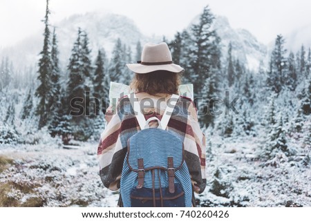 Similar – Image, Stock Photo Winter hiking trail in the spruce forest. Threateningly falling lines.