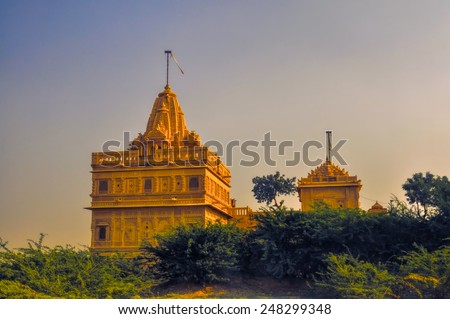 Picturesque view of temple in Thar Desert illuminated by the setting sun