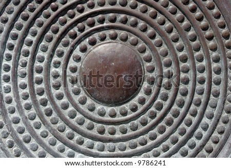 australian aboriginal style circles in bronze texture