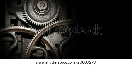 Cog and wheel details from machines of the industrial revolution with copy space