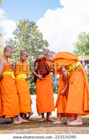 CHIANG MAI, THAILAND - OCTOBER 12: Unidentified Monks Yellow robe clad to novices in Fha wiang inn temple,Wiang Haeng District on October 12, 2014 in Chiang Mai, Thailand.