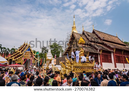 CHIANG MAI, THAILAND - APRIL 13: Buddha Phra Singh of Phra Singh temple was moved to the parade cars for pour water in Songkran festival on April 13, 2015 in Chiang Mai, Thailand.