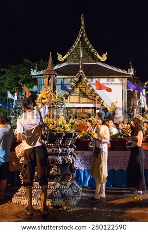 CHIANG MAI, THAILAND - MAY 15 : People worshiping offering flowers attended a ceremony to worship the city pillar (Inthakin Festival) at Chedi Luang temple on May 15, 2015 in Chiang mai, Thailand.