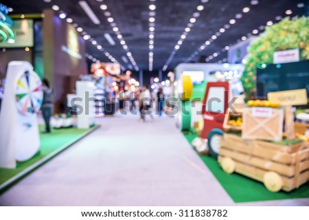 Abstract people walking in exhibition blurred defocusing background, Concept of business social gathering for meeting exchange.