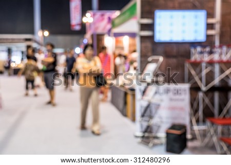 Abstract people walking in exhibition blurred defocusing background, Concept of business social gathering for meeting exchange.