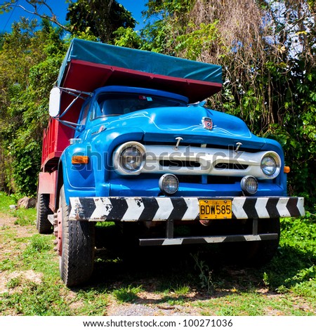 PINAR DEL RIO,CUBA-APRIL 7:Old Ford truck in a rural road April 7,2012 in Pinar del Rio.Before a new law issued on October 2011,cubans could only trade vehicles that were on the road before 1959