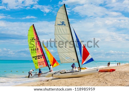VARADERO,CUBA-NOVEMBER 3:Foreign tourists sailing on a catamaran November 3,2012 in Varadero.The cuban revenues associated to the tourism industry have increased in a 7.7% this year compared to 2011