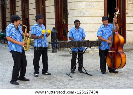 HAVANA-JANUARY 16:Traditional band playing for tourists January 16,2013 in Havana.Famous through the world,the cuban music is an attraction for more than 2 million people who visit Cuba every year