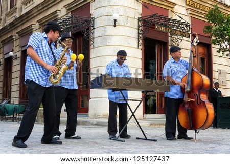 HAVANA-JANUARY 16:Traditional band playing for tourists January 16,2013 in Havana.Famous through the world,the cuban music is an attraction for more than 2 million people who visit Cuba every year
