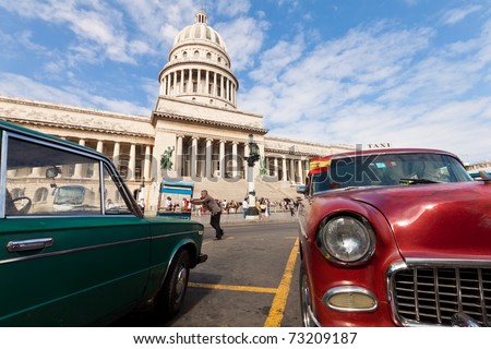 HAVANA-MARCH 14:Classic car parked in front of the Capitol May 14,2011 in Havana.Cubans keep thousands of old cars running even when parts have not been produced for decades and they\'ve become iconic