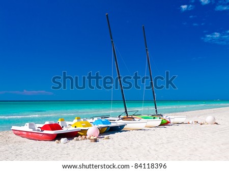 Sailing catamarans and water bikes in the beautiful beach of Varadero in Cuba